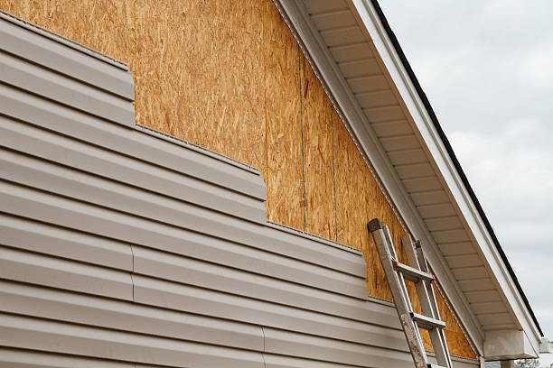 Professional Siding Installation technician working in Friendship, MD